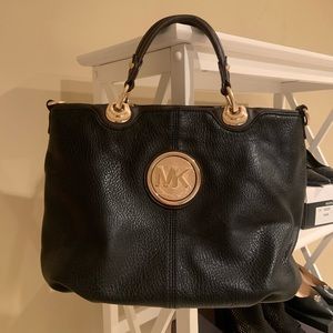 Black MK purse Rarely used- was a gift, it is authentic however no tag available